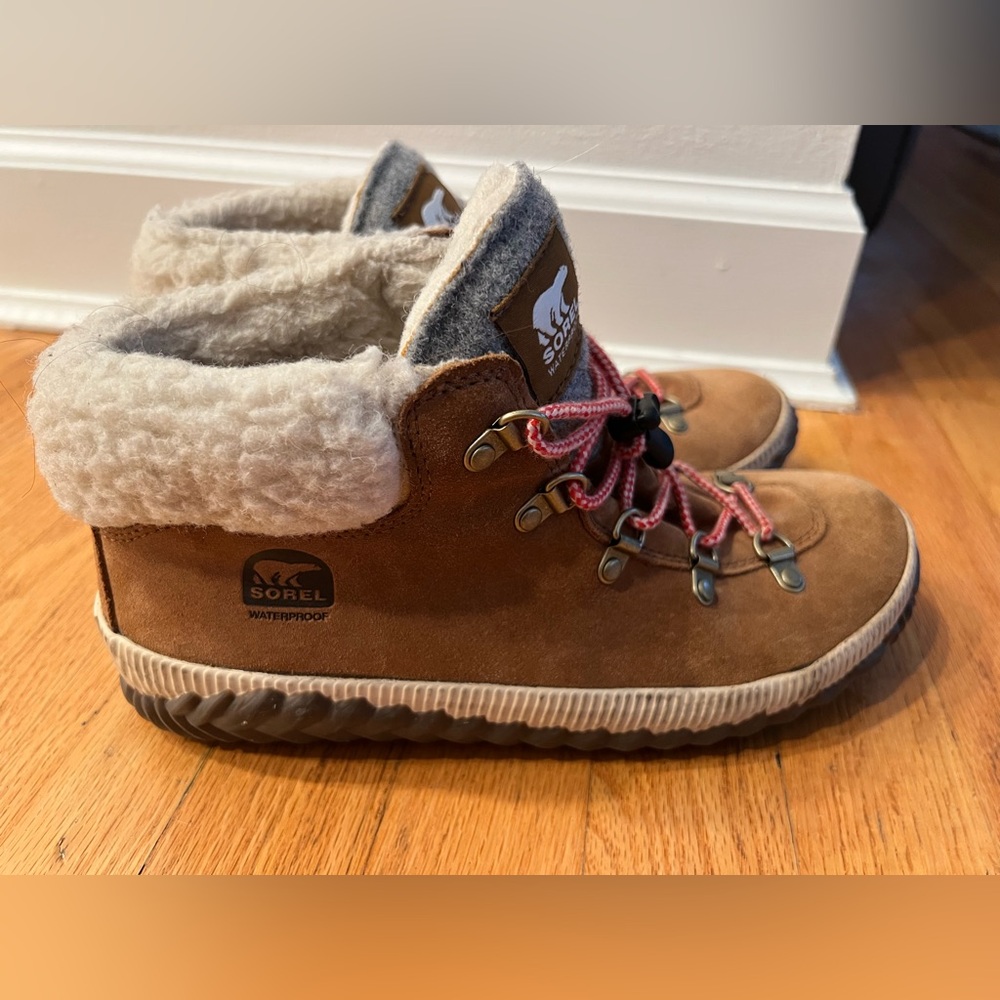 Sorel Out 'N About Conquest waterproof suede boots with a sherpa lining.